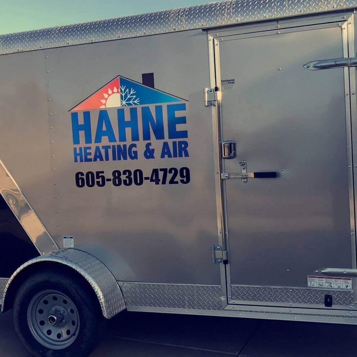 The Hahne Heating & Air logo on the side of our aluminum job trailer
